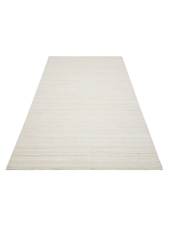 Tappeto tessuto a mano in misto lana e TENCEL™ della serie Palermo CREAM