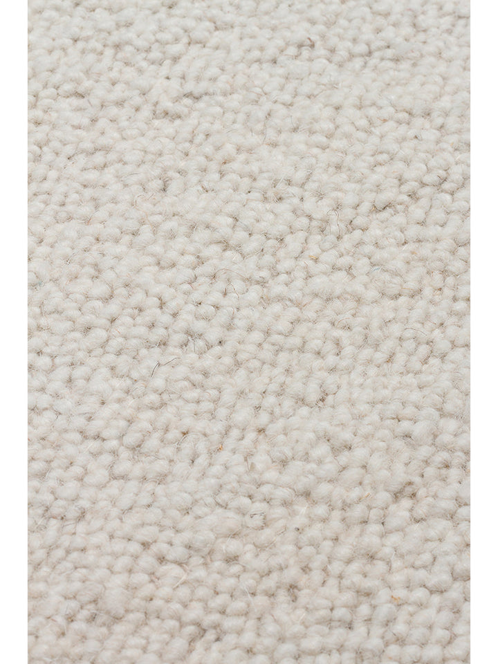 Tapis fait main en mélange de laine, polyester et coton de la série Agra IVOIRE